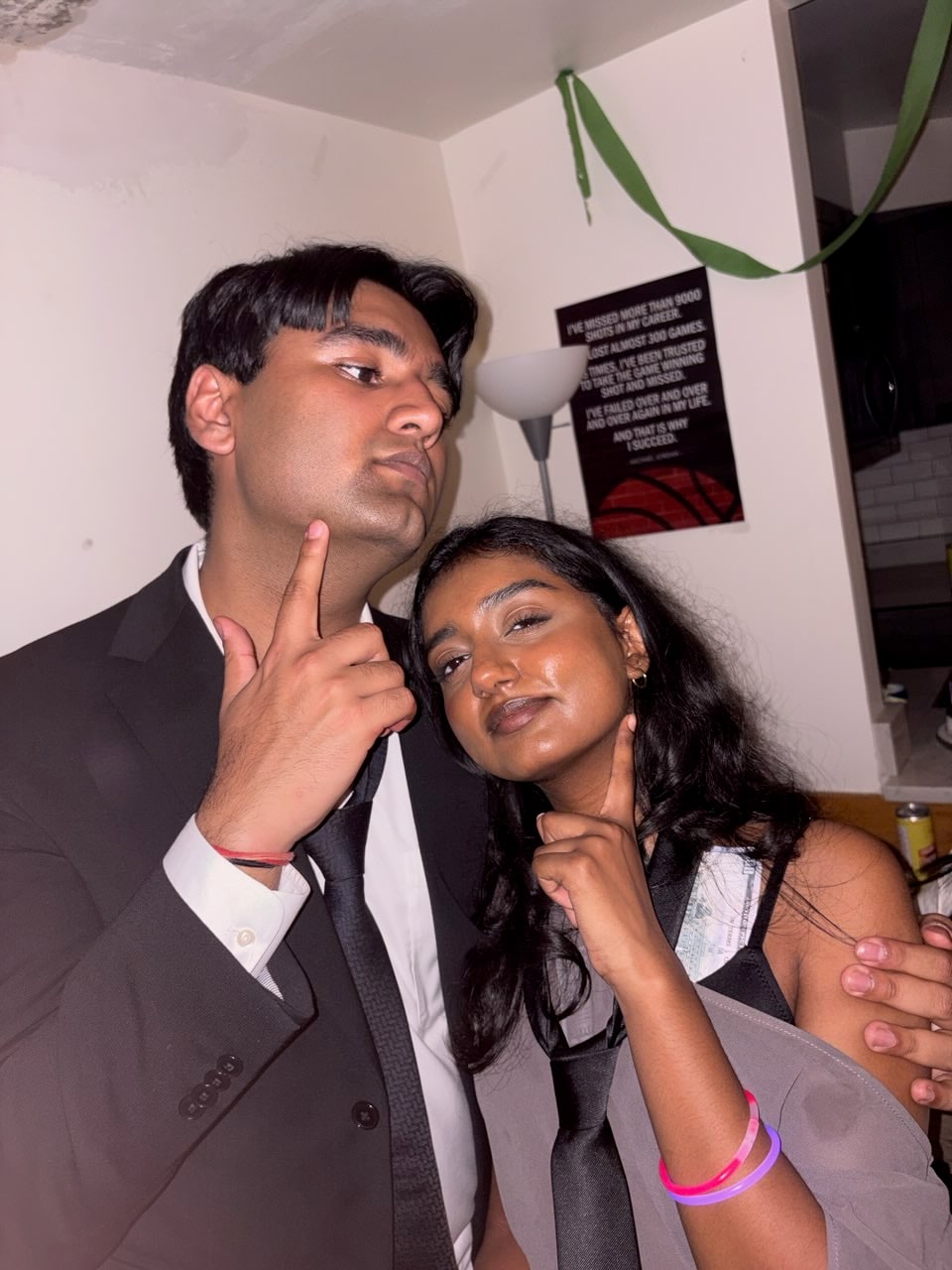 Sresth and Savi posing in formal attire