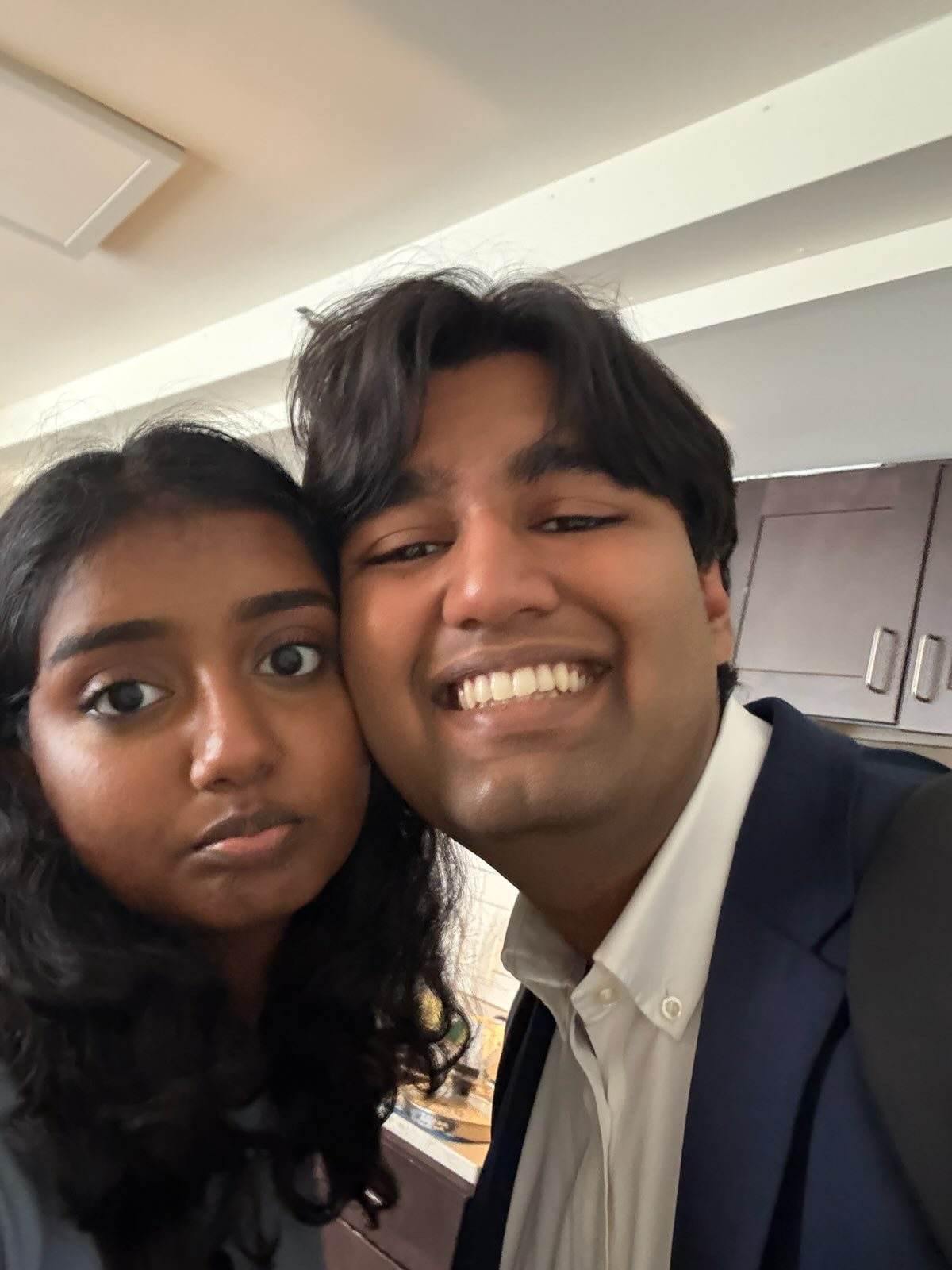 Sresth and Savi smiling together